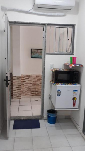 Sua Kitnet na Praia 12 Atenção PEQUENA Só prá dormir Ambiente Familiar Ar Cond TV Microondas Frigobar Internet Centro